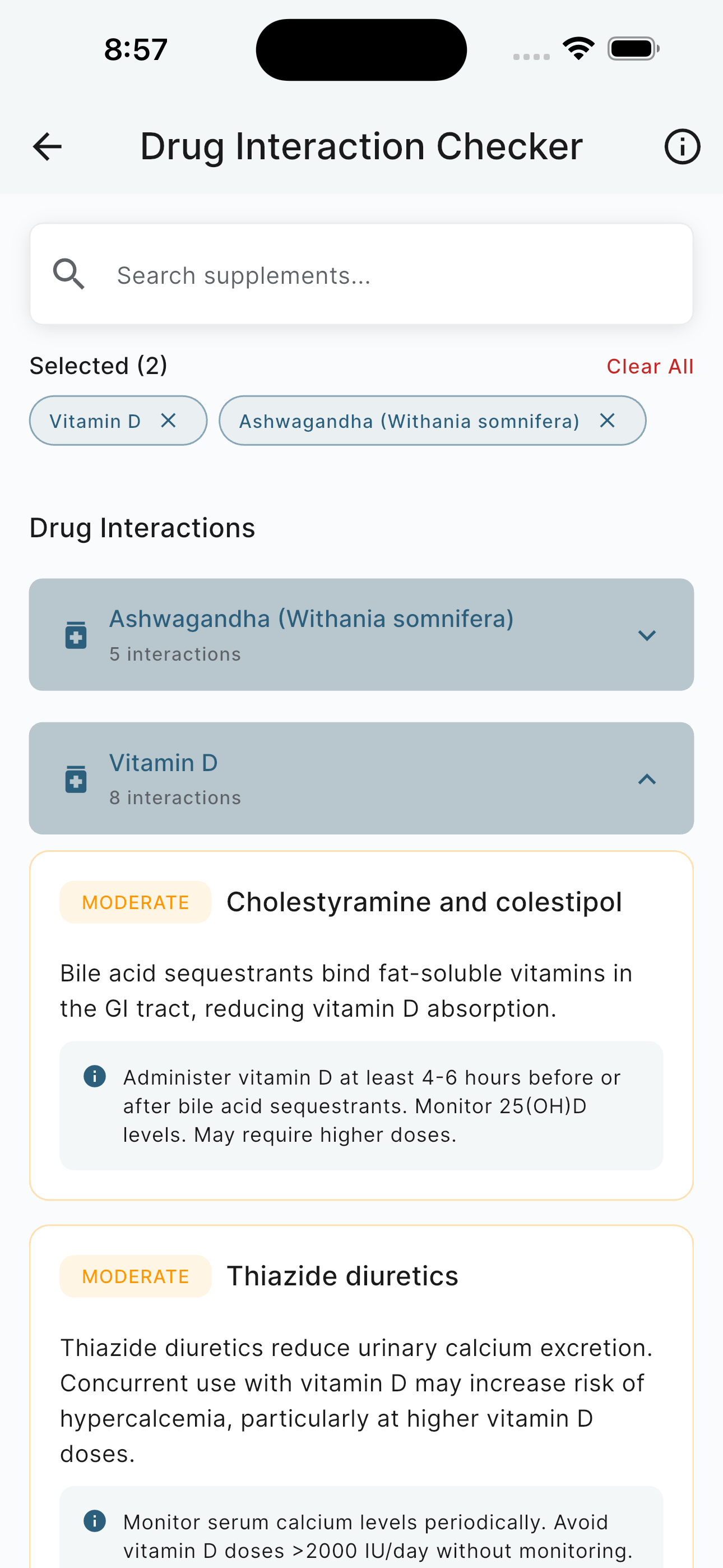 Drug interaction checker showing severity-rated interactions for selected supplements